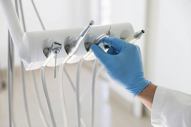 Professional Tooth Extraction technician working in Gilman, IL